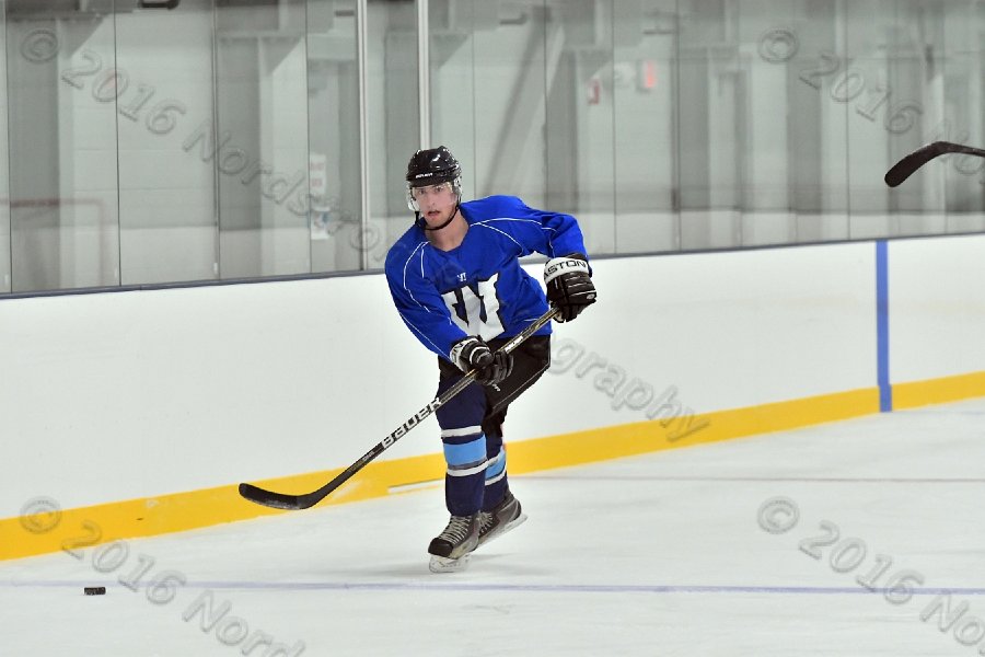 Wheaton College Men\'s Ice Hockey vs Middlesex Community College. - Photo By: KEITH NORDSTROM
